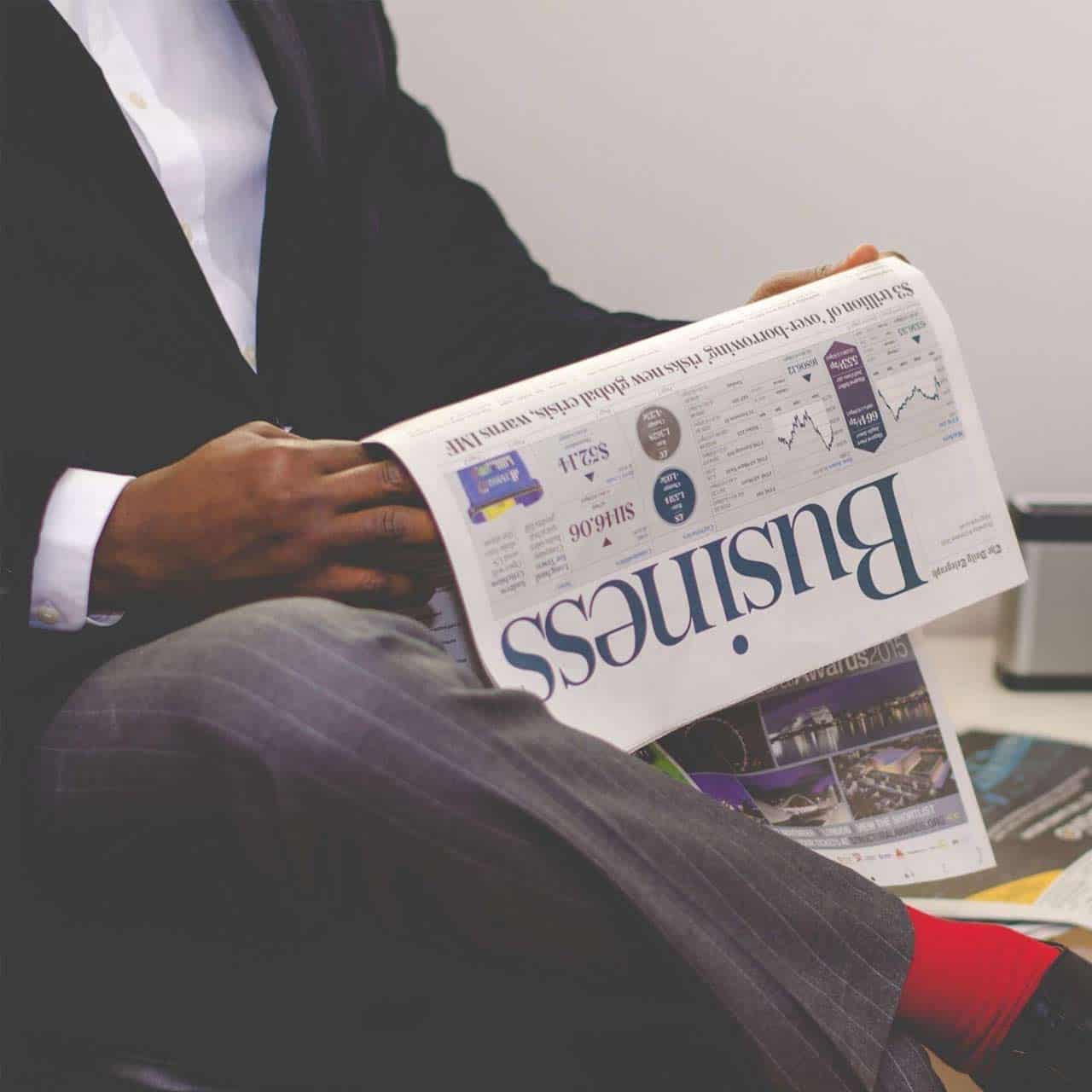 Man Reading Newspaper Capital Factor