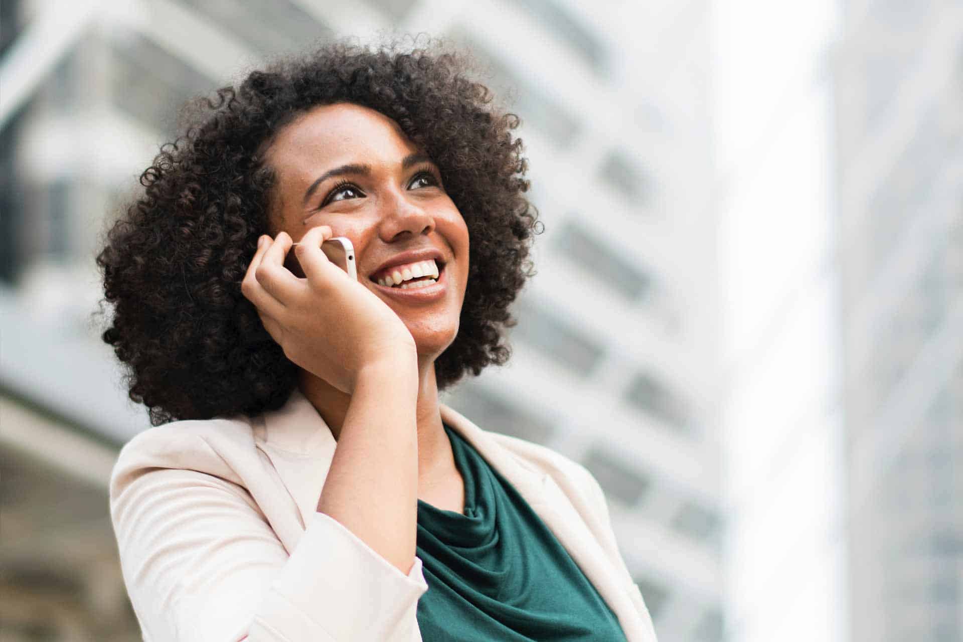 African woman on a phonecall Capital Factor